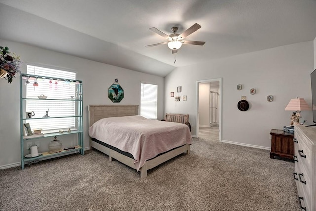 bedroom with carpet floors, ceiling fan, and vaulted ceiling