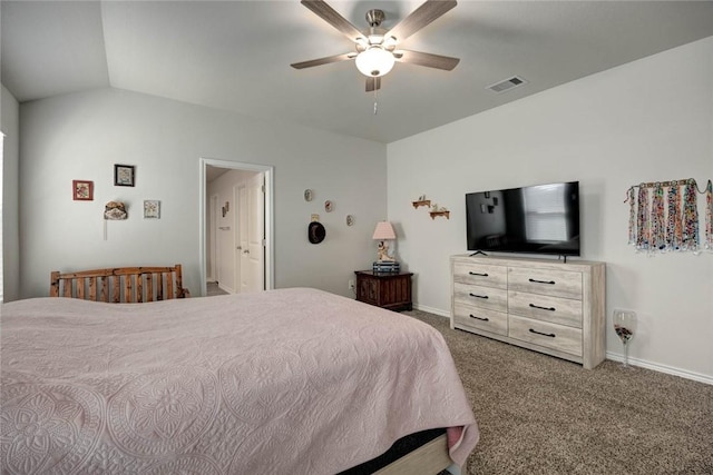 bedroom featuring connected bathroom, carpet flooring, ceiling fan, and vaulted ceiling