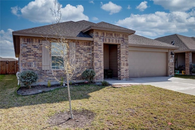 view of front facade featuring a garage and a front lawn