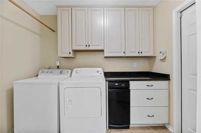 126 Whistlers Cove Rd, Rockport, TX 78382 - washroom with washer and dryer and light tile patterned floors