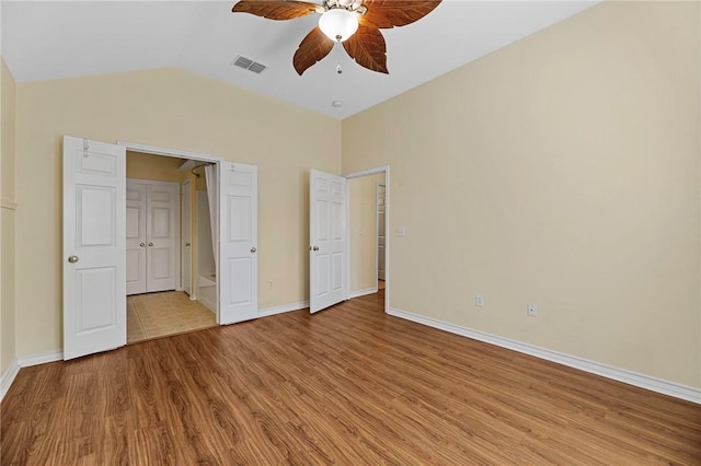 126 Whistlers Cove Rd, Rockport, TX 78382 - unfurnished bedroom featuring vaulted ceiling, light wood-style flooring, baseboards, and ceiling fan