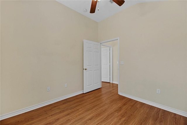 126 Whistlers Cove Rd, Rockport, TX 78382 - unfurnished room with ceiling fan, wood finished floors, baseboards, and lofted ceiling