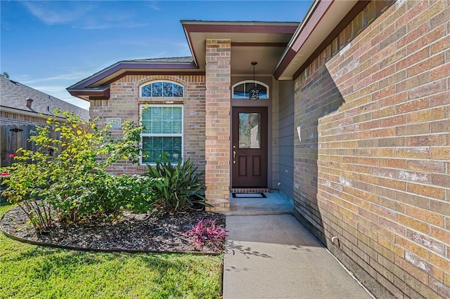 126 Whistlers Cove Rd, Rockport, TX 78382 - doorway to property with brick siding