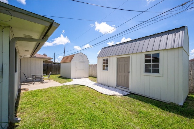 2722 Camargo Dr, Corpus Christi, TX 78415 - view of yard featuring a shed and a patio area