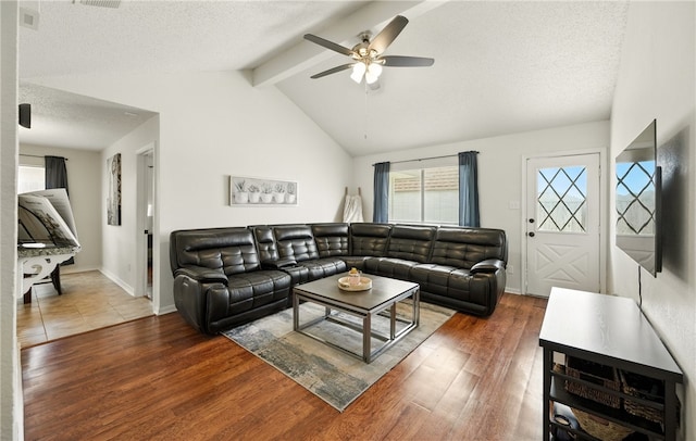 2722 Camargo Dr, Corpus Christi, TX 78415 - living area with ceiling fan, wood finished floors, and a textured ceiling