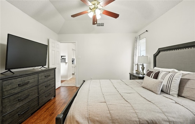 2722 Camargo Dr, Corpus Christi, TX 78415 - bedroom featuring dark wood-style flooring and a ceiling fan