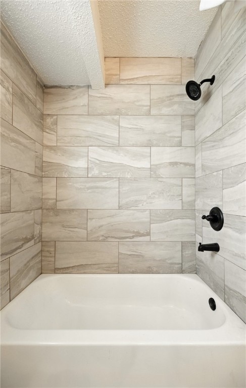 2722 Camargo Dr, Corpus Christi, TX 78415 - full bathroom featuring a textured ceiling and bathtub / shower combination