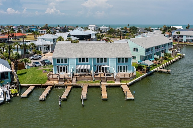 drone / aerial view with a water view