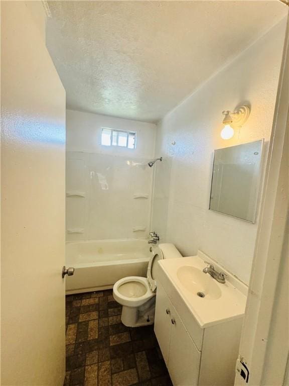 1725 Sycamore Pl, Corpus Christi, TX 78416 - bathroom with vanity, toilet, a textured ceiling, and shower / tub combination
