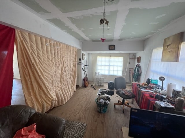 miscellaneous room featuring hardwood / wood-style floors