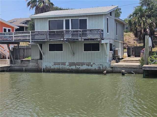 602 N Sandpiper, Ingleside, TX 78362 - dock featuring a water view