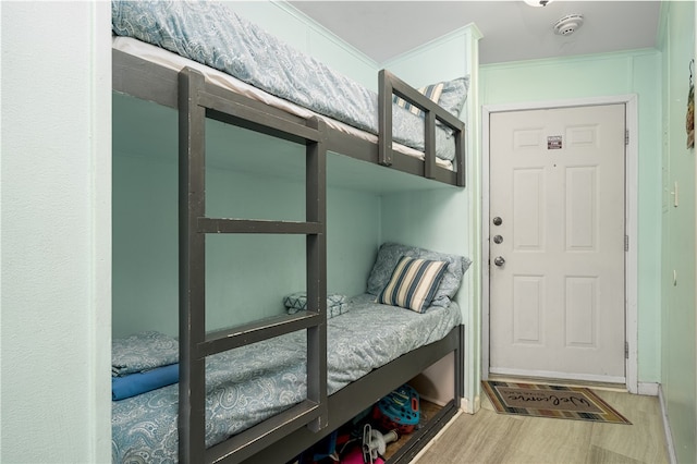 mudroom with hardwood / wood-style floors