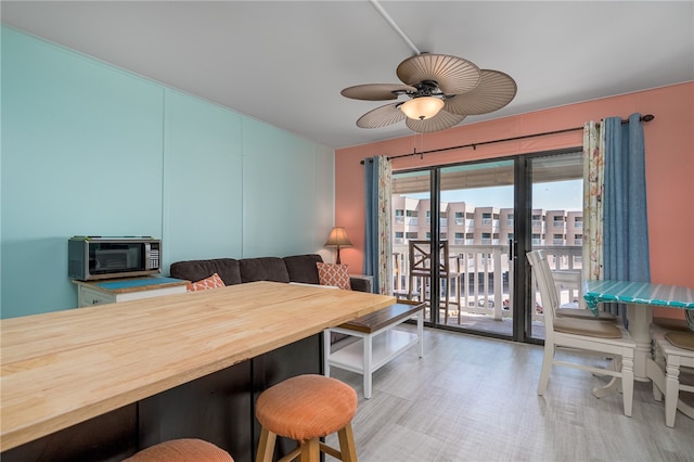 dining area featuring ceiling fan