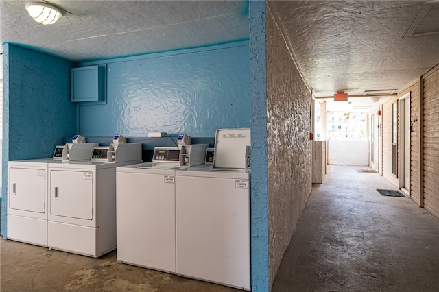 laundry room with washer and clothes dryer