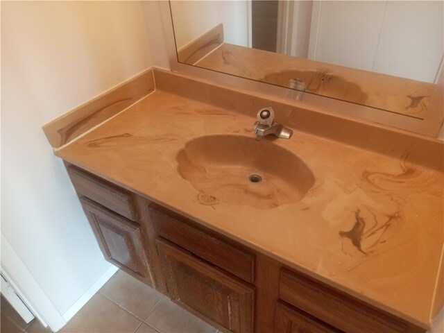 bathroom with vanity and tile patterned floors