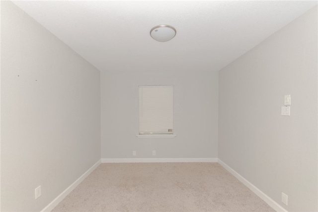 bonus room with light colored carpet