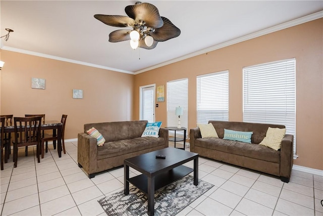 15102 Leeward Dr Unit 502, Corpus Christi, TX 78418 - living area featuring crown molding, light tile patterned flooring, baseboards, and ceiling fan