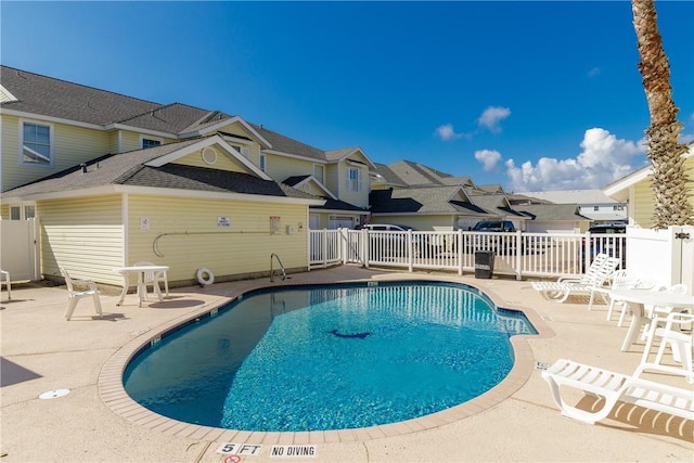 15102 Leeward Dr Unit 502, Corpus Christi, TX 78418 - community pool featuring a residential view and a patio area