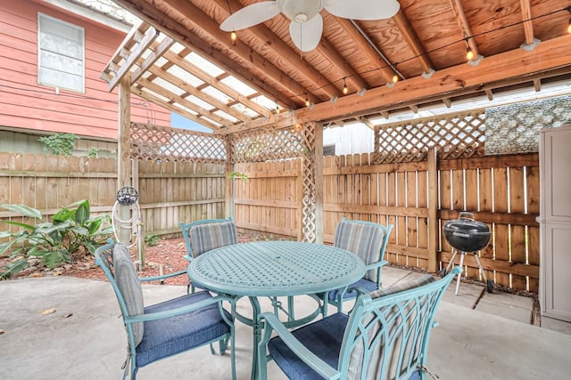 view of patio / terrace with outdoor dining space, a ceiling fan, and fence