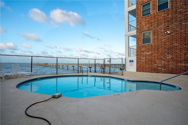 4334 E Ocean Dr Unit 306, Corpus Christi, TX 78404 - community pool with a patio area