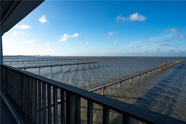 4334 E Ocean Dr Unit 306, Corpus Christi, TX 78404 - dock featuring a water view and a pier