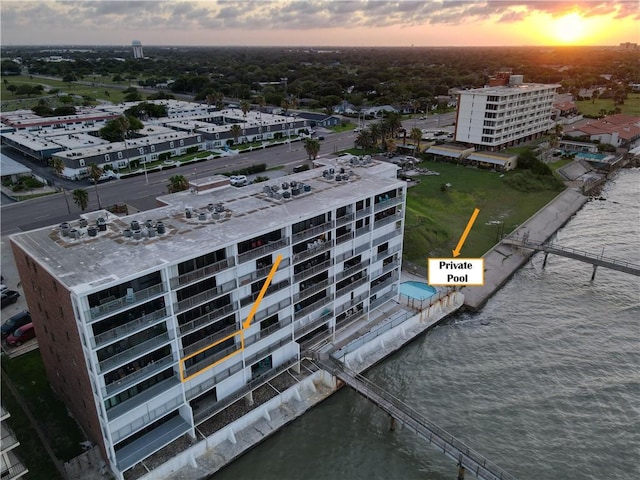 4334 E Ocean Dr Unit 306, Corpus Christi, TX 78404 - aerial view at dusk of a water view