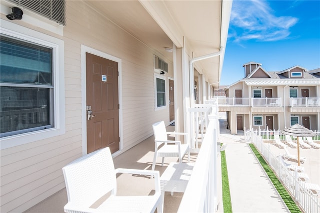 view of patio / terrace with a balcony