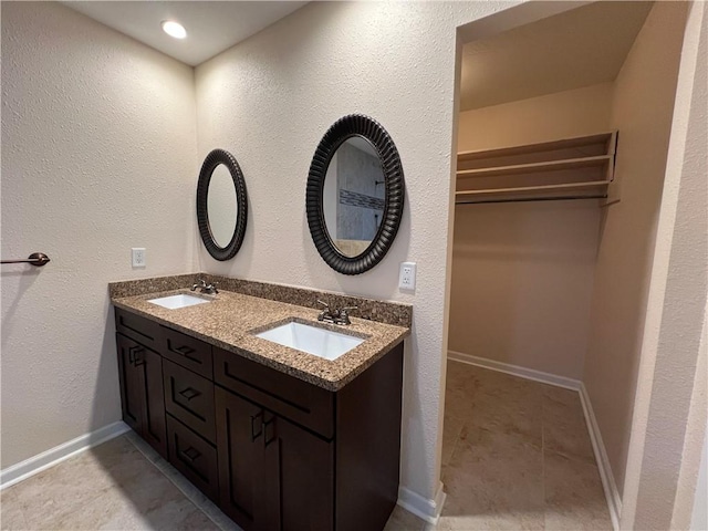 bathroom featuring vanity and tile patterned floors