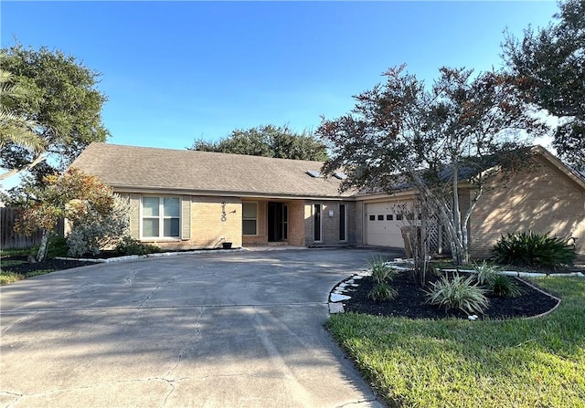 single story home with a garage