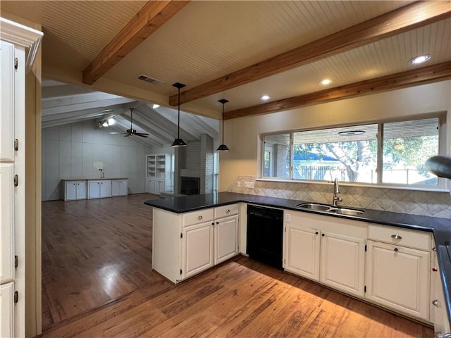 kitchen with white cabinets, dishwasher, ceiling fan, and kitchen peninsula