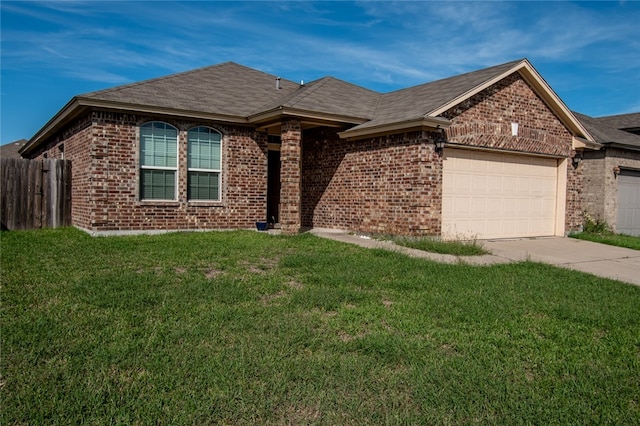 ranch-style house with a garage and a front yard