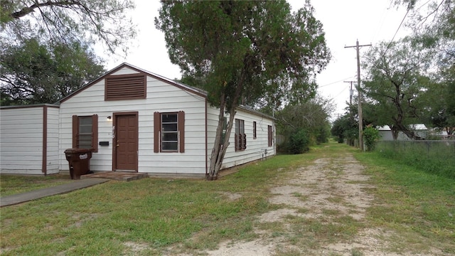 view of front of home with a front yard