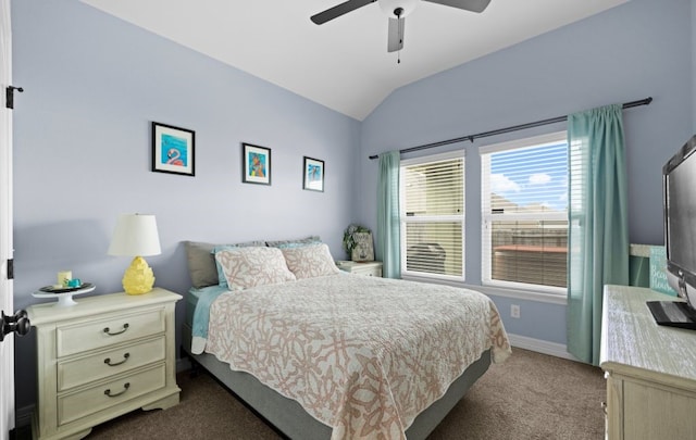 carpeted bedroom with ceiling fan and lofted ceiling