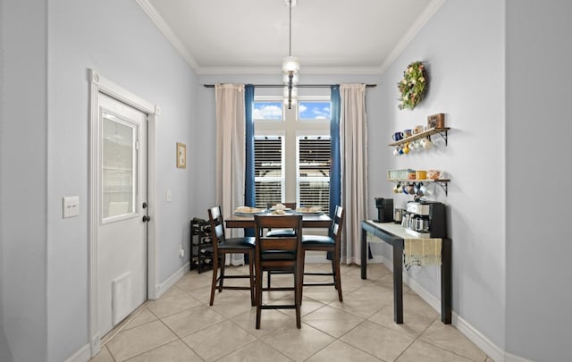 tiled dining area with an inviting chandelier and crown molding