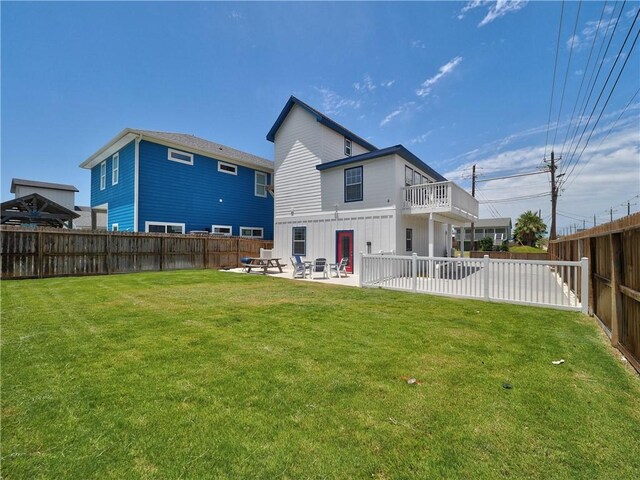 514 Royal Palm Dr, Port Aransas, TX 78373 - rear view of property featuring a patio and a balcony