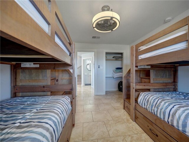 514 Royal Palm Dr, Port Aransas, TX 78373 - bedroom with light tile patterned floors