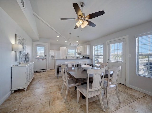 514 Royal Palm Dr, Port Aransas, TX 78373 - dining space with lofted ceiling, healthy amount of natural light, a ceiling fan, light tile patterned floors, and recessed lighting