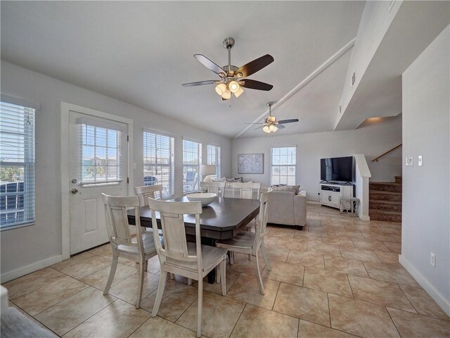 514 Royal Palm Dr, Port Aransas, TX 78373 - dining room featuring baseboards, a ceiling fan, lofted ceiling, and stairway