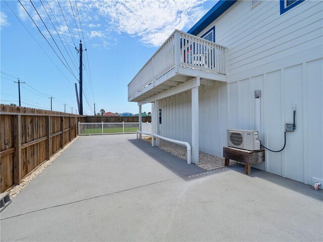 514 Royal Palm Dr, Port Aransas, TX 78373 - view of patio / terrace with a balcony and ac unit