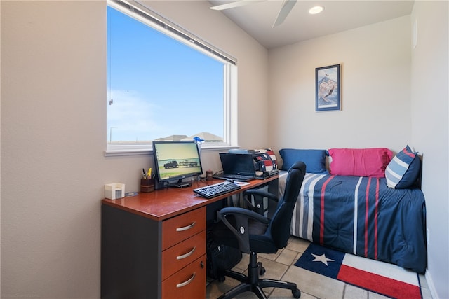 tiled office featuring ceiling fan