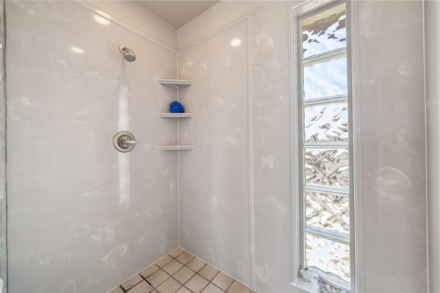 113 Sea Air Ln, Port Aransas, TX 78373 - bathroom with plenty of natural light, tile patterned floors, and a shower