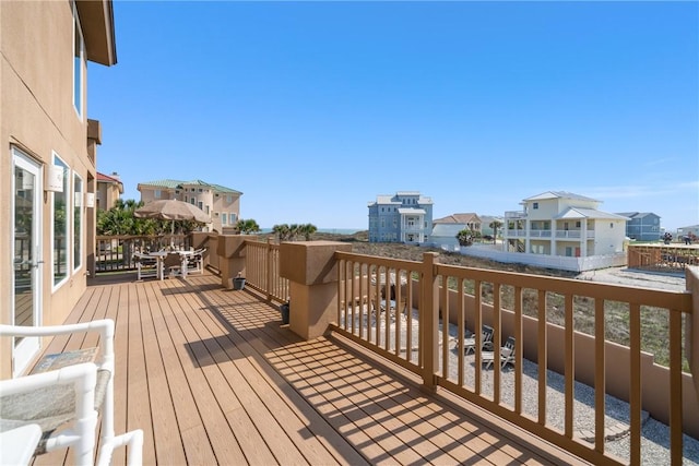 113 Sea Air Ln, Port Aransas, TX 78373 - deck featuring a residential view and outdoor dining area