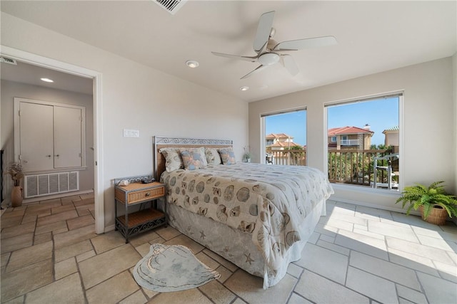 113 Sea Air Ln, Port Aransas, TX 78373 - bedroom with access to exterior, recessed lighting, and a ceiling fan