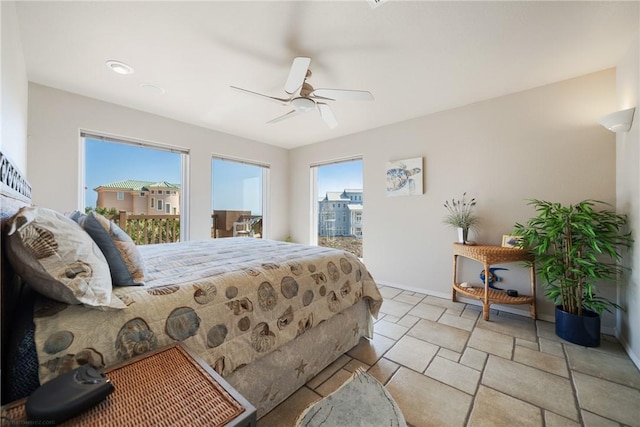 113 Sea Air Ln, Port Aransas, TX 78373 - bedroom featuring baseboards and ceiling fan