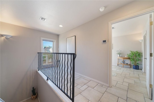 113 Sea Air Ln, Port Aransas, TX 78373 - hall with an upstairs landing and recessed lighting