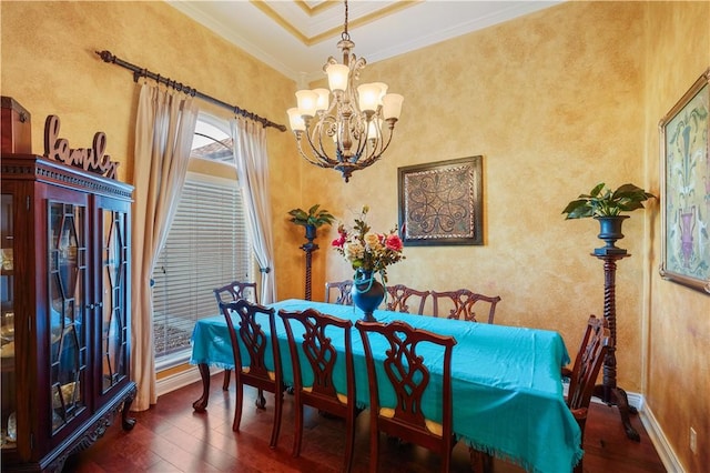 8401 Lago Vista Dr, Corpus Christi, TX 78414 - dining space featuring wood-type flooring, a chandelier, crown molding, and baseboards