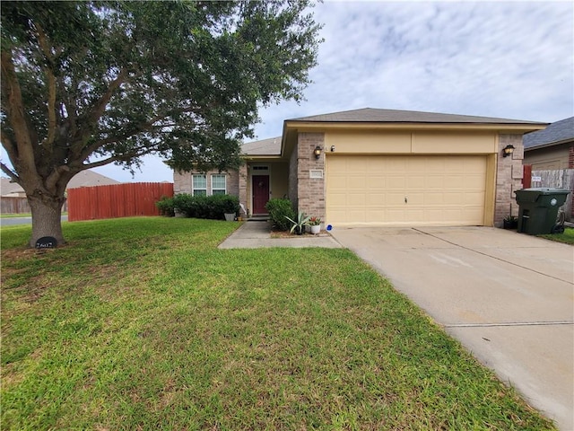2602 Whirlwind St, Corpus Christi, TX 78414 - ranch-style house with an attached garage, driveway, and brick siding