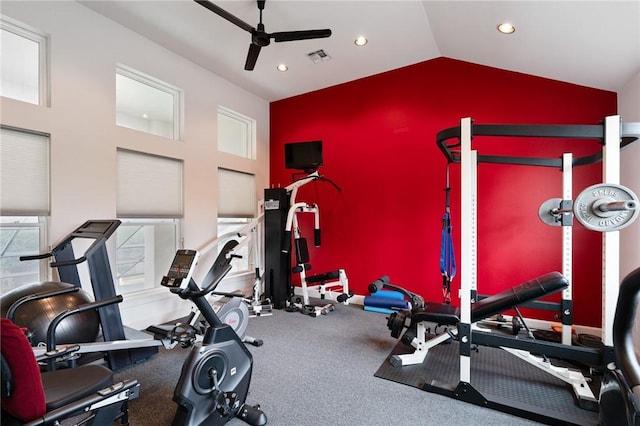 exercise area featuring vaulted ceiling, recessed lighting, a ceiling fan, and visible vents