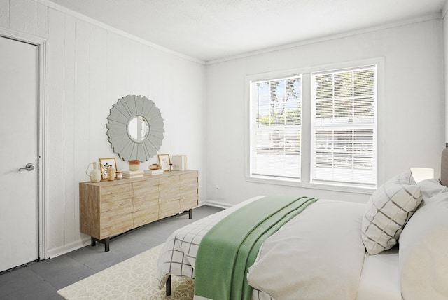 tiled bedroom featuring crown molding