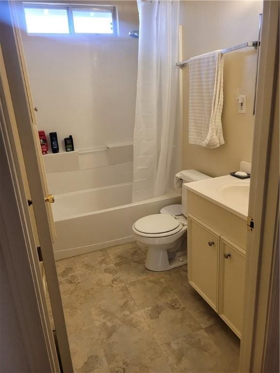 full bathroom with vanity, shower / bath combo with shower curtain, and toilet